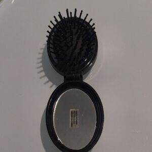 Compact Black Hairbrush with Mirror